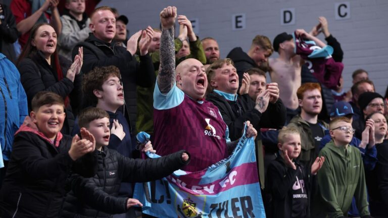 Burnley seek payment from fans who invaded pitch after promotion